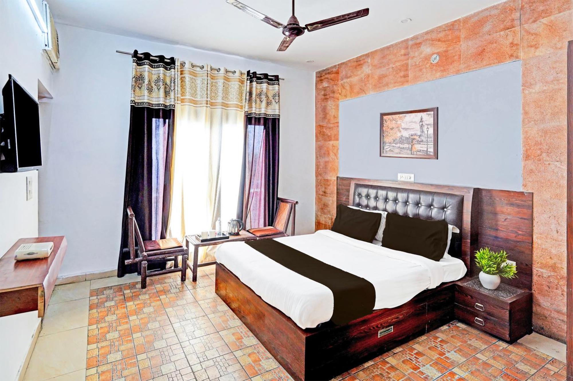 Super Hotel O Palm Dehradun Luaran gambar